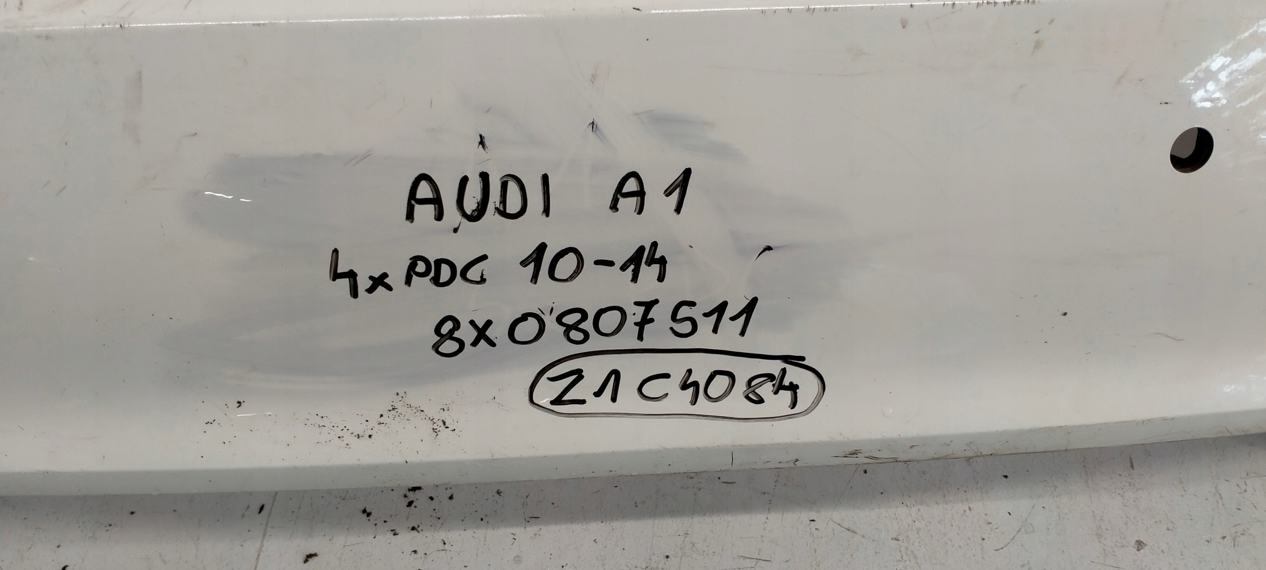 12880308631